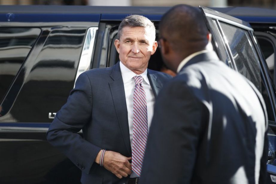 President Donald Trump's former National Security Advisor Michael Flynn arrives at federal court in Washington, Tuesday, Dec. 18, 2018. (AP Photo/Carolyn Kaster)