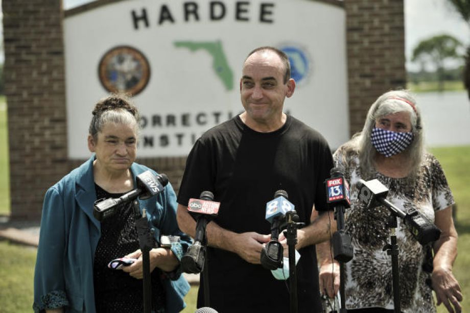 Aug. 27 2020 file photo, former inmate Robert DuBoise, 56, meets reporters with his sister Harriet, left, and mother Myra, right, outside the Hardee County Correctional Institute after serving 37 years in prison, when officials discovered new evidence that proved his innocence in Hardee County, Fla. DuBoise,