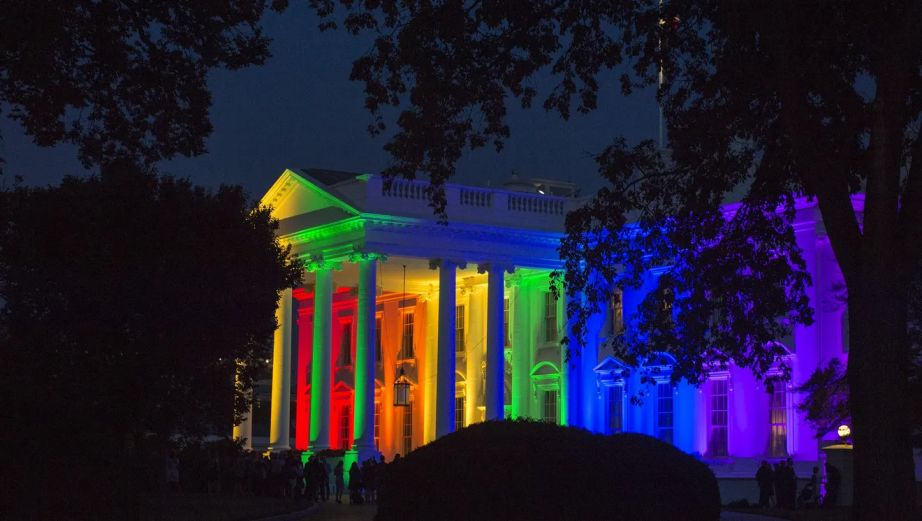 The White House lit up in rainbow colors to celebrate the Supreme Court's opinion legalizing gay marriage in all fifty states on June 26, 2015 (Shutterstock via HRC.org)