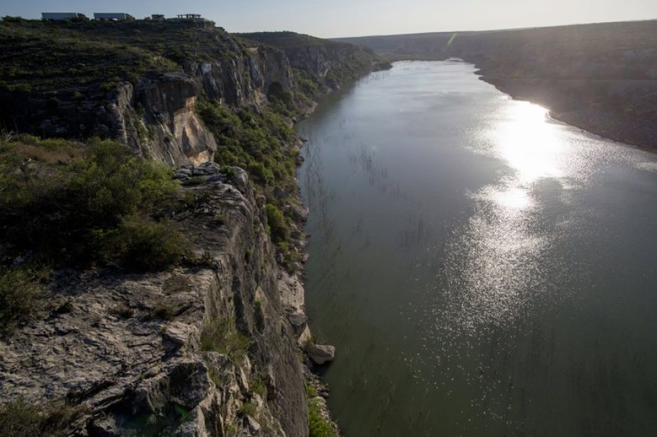 Pecos River flows near the U.S.-Mexico border near Terlingua, Texas. Ranchers in a southeastern New Mexico community and a potash company are locking in fight over water rights connected to the Pecos River. (AP Photo/Rodrigo Abd, File)