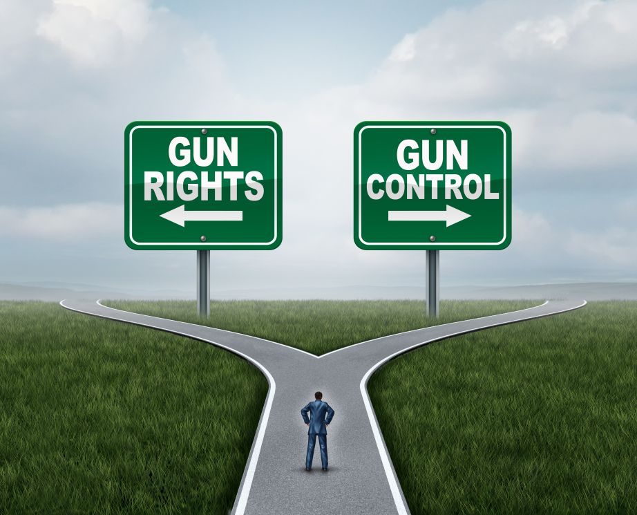 Gun rights left sign and gun control right sign