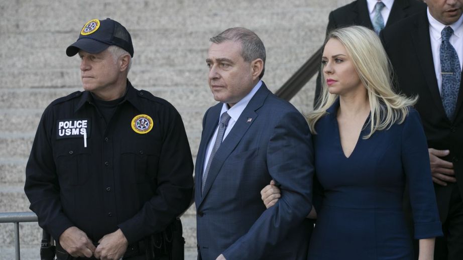 Lev Parnas, center, leaves federal court following his arraignment, Wednesday, Oct. 23, 2019 in New York.