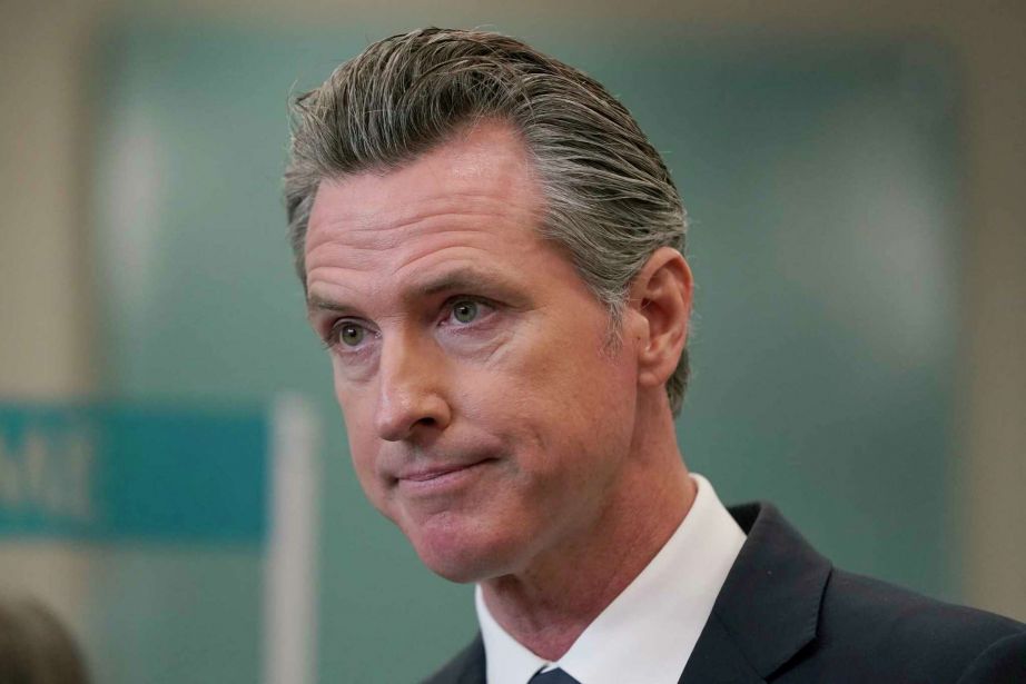 Gov. Gavin Newsom speaks at a news conference in Oakland, Calif.