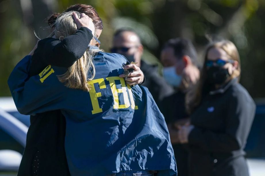 FBI agent leaves the Broward County Office of Medical Examiner and Trauma Services in Fort Lauderdale, Florida