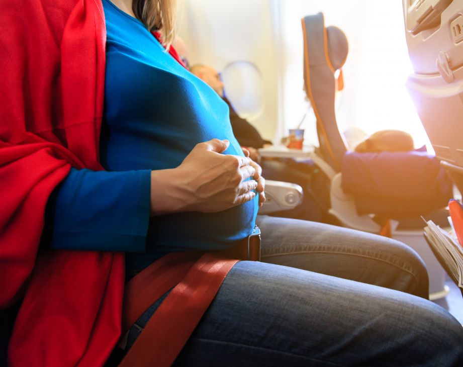 Pregnant woman on plane